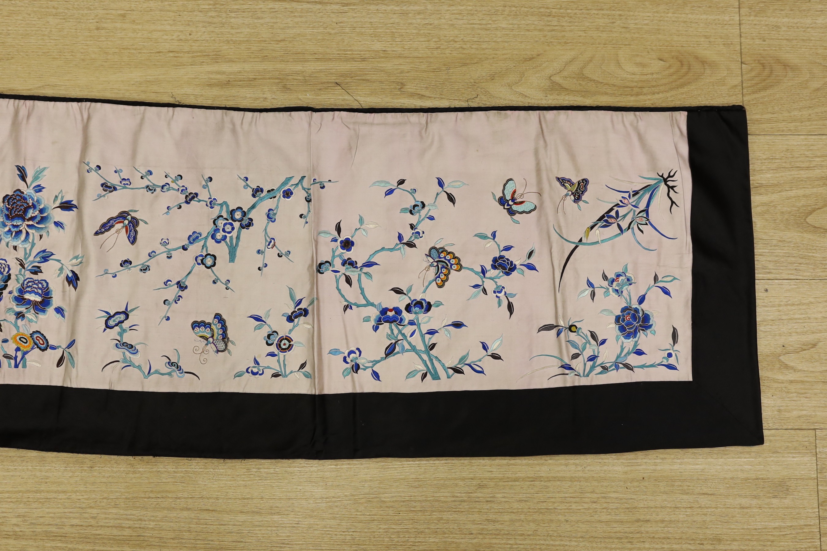 A Chinese polychrome silk embroidered panel, possibly part of a Chinese robe